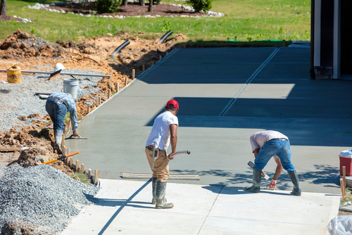Concrete Workers working on an addition to a home