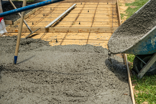 Pouring concrete as an addition to a home